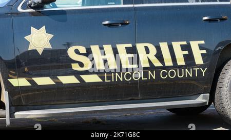 Newport, OR, USA - September 20, 2022; Sheriff name on side of Lincoln County vehicle with badge Stock Photo