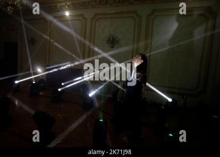 Bucharest, Romania. 16th Oct, 2022. A woman enjoys an interactive light installation while visiting the 3rd edition of the new media art festival RADAR in Bucharest, capital of Romania, Oct. 16, 2022. Credit: Cristian Cristel/Xinhua/Alamy Live News Stock Photo