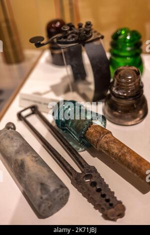 tools used to build electrical lines for telegraph machines to carry communication Stock Photo