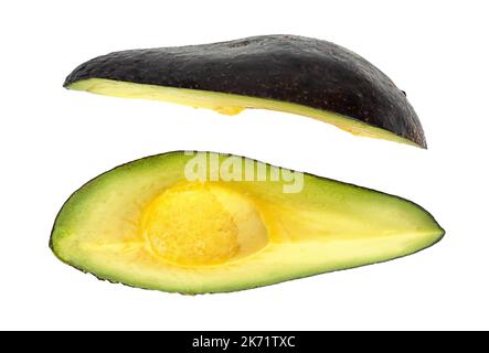 Green avocado two slices isolated on white background Stock Photo