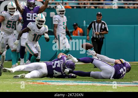 Sunday, October 16, 2022; Miami Gardens, FL USA;  Miami Dolphins safety Elijah Campbell (22) and Minnesota Vikings linebacker Eric Kendricks (54) figh Stock Photo