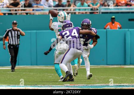 Minnesota Vikings safety Camryn Bynum (24) defends Miami Dolphins wide  receiver Tyreek Hill (10) during the