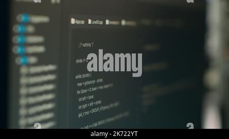 Computer display of software developer typing database functions script on terminal window, cloud computing. Displaying source code and hmtl script with it coding or programming language. Close up. Stock Photo