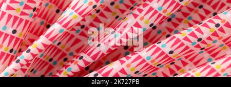 Multicolored bright cotton fabric with geometric shapes Stock Photo