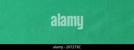 Poker table felt background in green color Stock Photo