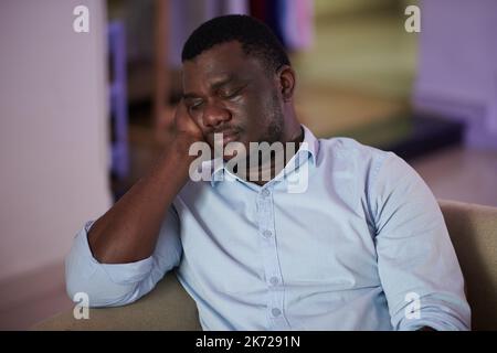 Exhausted businessman fell asleep while resting on sofa during break Stock Photo