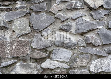 Stone masonry of large cobblestones. Stock Photo