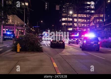 Seattle, USA. 16th Sep, 2022. Just after 10:45pm Police responding to a shooting on 7th ave between Lenora and Blanchard Street in South Lake Union near the Amazon campus. A vehicle was located across from the first Amazon Go store with a shot out driver side window. Police arrived and secured the scene and are actively looking for the suspect of the alleged shooting. This follows another shooting in the same location last month on the 11th of September where a ride share driver was shot and killed. Credit: James Anderson/Alamy Live News Stock Photo