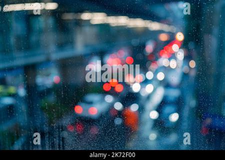 Rain on window with traffic jam view Stock Photo