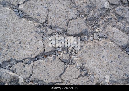 Heavy cracked concrete floor with rubbles Stock Photo