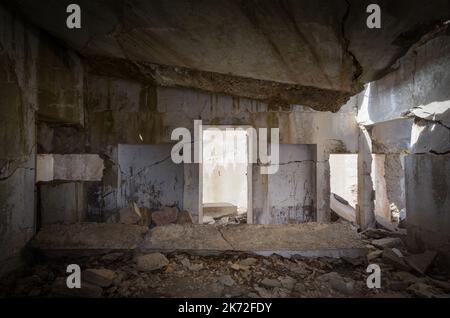 Ruins of the second world war italian military barracks and guardhouse near the pass of of San Bernolfo and Colle Lounge, hiking path between the fren Stock Photo