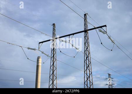 Low angle view of electricity pylon Stock Photo