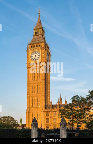 The 96m clock tower of Big Ben (the Elizabeth Tower), part of the Palace of Westminster, after its recent 4-year renovation, in late evening light Stock Photo