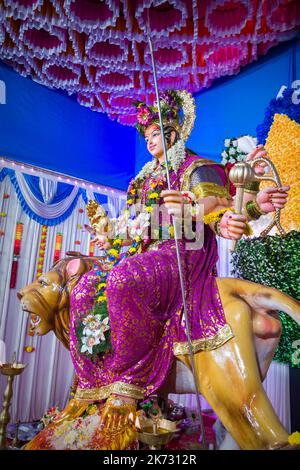 A beautiful idol of Maa Durga being worshipped at a mandal in Mumbai for the auspicious Indian festival of Navratri Stock Photo