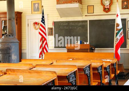 An 18th Century one room schoolhouse in Old Sacramento shows how students learned and how education occurred in an American western frontier school Stock Photo