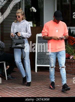 Sofia Richie and Lewis Hamilton have lunch together at Mauro's Cafe in West Hollywood. Stock Photo