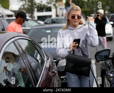 Sofia Richie and Lewis Hamilton have lunch together at Mauro's Cafe in West Hollywood. Stock Photo