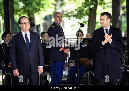 Outgoing President Francois Hollande and elected President Emmanuel Macron jointly commemorate the 12th national day of the Memoirs of the Treaty, Slavery and their Abolition in Paris in the gardens of Luxembourg Stock Photo