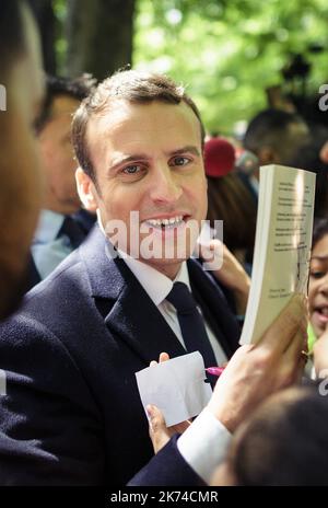 Outgoing President Francois Hollande and elected President Emmanuel Macron jointly commemorate the 12th national day of the Memoirs of the Treaty, Slavery and their Abolition in Paris in the gardens of Luxembourg Stock Photo