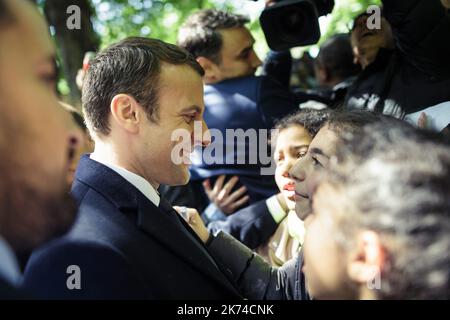 Outgoing President Francois Hollande and elected President Emmanuel Macron jointly commemorate the 12th national day of the Memoirs of the Treaty, Slavery and their Abolition in Paris in the gardens of Luxembourg Stock Photo