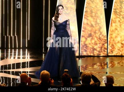 Italian actress and master of ceremonies Monica Bellucci blows kisses as she arrives on stage  Stock Photo