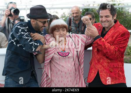 Singer Matthieu Chedid, director Agnes Varda and JR attend the 'Faces, Places (Visages, Villages)' photocall during the 70th annual Cannes Film Festival at Palais des Festivals Stock Photo