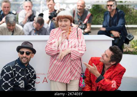 Singer Matthieu Chedid, director Agnes Varda and JR attend the 'Faces, Places (Visages, Villages)' photocall during the 70th annual Cannes Film Festival at Palais des Festivals Stock Photo