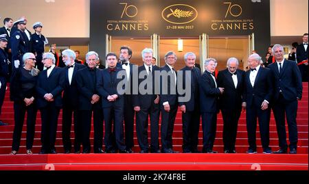 ; (FromL) New Zealander director Jane Campion, British director Ken Loach, Austrian director Michael Haneke, Greek director Costa-Gavras, Romanian director Cristian Mungiu, Italian director Nanni Moretti, US director David Lynch, Swedish director Bille August, French director Claude Lelouch, French-Polish director Roman Polanski, US director Jerry Schatzberg, Algerian director Mohammed Lakhdar-Hamina and French director Laurent Cantet pose as they arrive on May 23, 2017 for the '70th Anniversary' ceremony of the Cannes Film Festival in Cannes, southern France.   70th annual Cannes Film Festiv Stock Photo