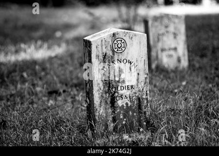 Calera, Alabama, USA-Sept. 30, 2022: Grave stone for one of the many unknown Confederate soldiers buried at Shelby Springs Confederate Cemetery. Stock Photo