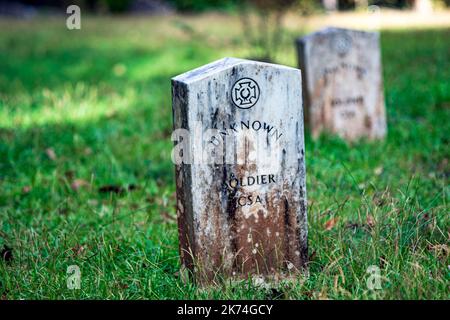 Calera, Alabama, USA-Sept. 30, 2022: Grave stone for one of the many unknown Confederate soldiers buried at Shelby Springs Confederate Cemetery. Stock Photo