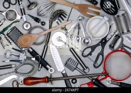 https://l450v.alamy.com/450v/2k74kpt/kitchen-utensils-kitchen-utensils-are-small-hand-held-tools-used-for-food-preparation-common-kitchen-tasks-include-cutting-food-items-to-size-baki-2k74kpt.jpg