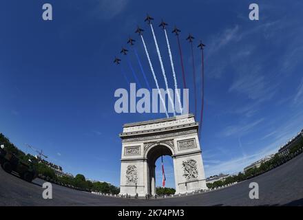 French President Emmanuel Macron and Chief of the Defence Staff, French Army General Pierre de Villiers during the annual Bastille Day military parade on the Champs-Elysees avenue in Paris on July 14, 2017. Stock Photo