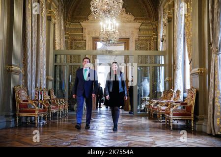 Mayor of Paris and C40 president receives R20 founder and former California state governor Arnold Schwarzenegger in Paris on December 11, 2017. Stock Photo