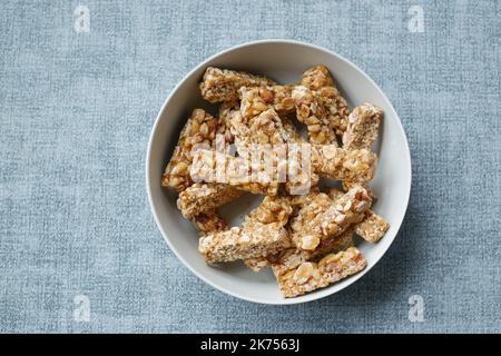 peanuts sweet candy in a bowl on table  Stock Photo
