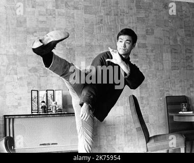 Circa 1966, Hollywood, California, USA: BRUCE LEE played Kato, a martial arts expert and faithful sidekick to the crime-fighting masked hero, the Green Hornet, otherwise known as millionaire newspaper publisher, Britt Reid, in this 1966-67 series. (Credit Image: © Doris Nieh/Globe Photos/ZUMA Wire) Stock Photo