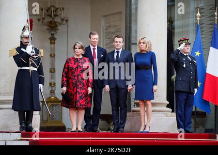 EN PRESENCE DE BRIGITTE MACRON. French President Emmanuel Macron receives Grand Duke Henri and Duchess Maria Teresa of Luxembourg at the Elysee Palace in Paris, on March 19, 2018. Stock Photo