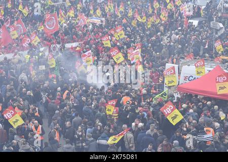 Festive procession for the first demonstration of railway workers against the reform of the SNCF, joining the way the demonstrators of the civil service. In all, several thousand people gathered in Paris. Stock Photo