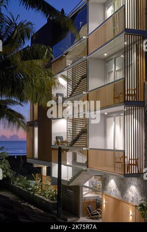 View towards side entrance at dusk. Harding Boutique Hotel, Ahangama, Sri Lanka. Architect: ANARCHITECT , 2021. Stock Photo
