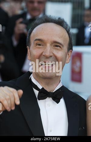 Italian director Roberto Benigni arrives on May 19, 2018 for the closing ceremony and the screening of the film 'The Man Who Killed Don Quixote' at the 71st edition of the Cannes Film Festival in Cannes, southern France. Stock Photo
