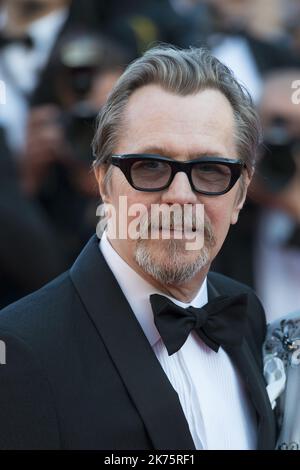 Actor Gary Oldman arrives on May 19, 2018 for the closing ceremony and the screening of the film 'The Man Who Killed Don Quixote' at the 71st edition of the Cannes Film Festival in Cannes, southern France.  Stock Photo