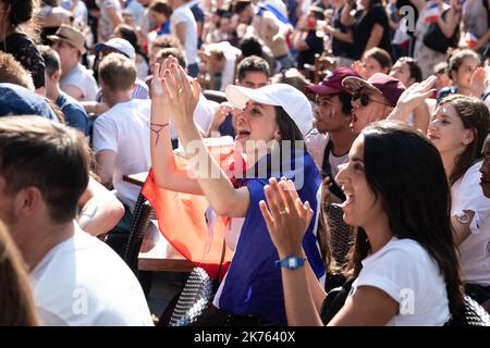 Christophe Morin / IP3 . French supporters look in a bar, the final of the 2018 Football World Cup between France and Croatia, in Paris, France, on July 15th, 2018. Stock Photo