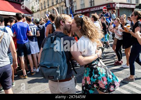 Christophe Morin / IP3 . French supporters look in a bar, the final of the 2018 Football World Cup between France and Croatia, in Paris, France, on July 15th, 2018. Stock Photo