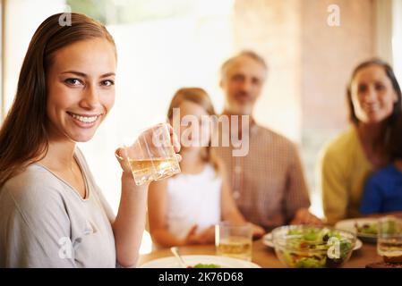 Having a healthy meal with my loved ones. Cropped shot of a family enjoying a healthy lunch. Stock Photo