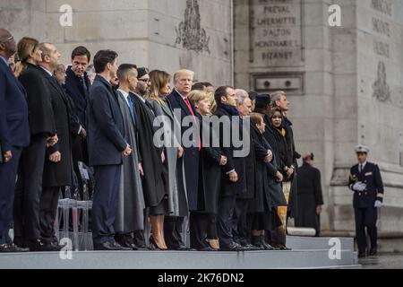 US President Donald Trump, Federal Chancellor of Germany Angela Merkel, French President Emmanuel Macron, Russian President Vladimir Poutine, accompanied by many foreign dignitaries attend a ceremony at the Arc de Triomphe in Paris on November 11, 2018 as part of commemorations marking the 100th anniversary of the 11 November 1918 armistice, ending World War I.  