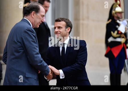 The President of the French Republic, Emmanuel Macron receives the President of the Group of the World Bank, David Malpass in interview at the Elysee Palace, May 06, 2019 Stock Photo
