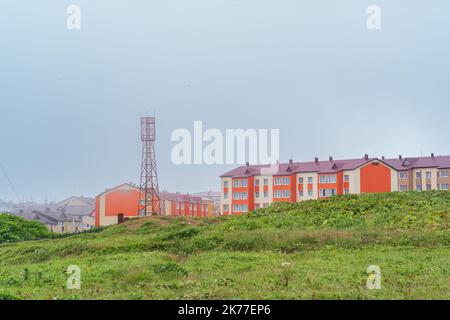 view of the town of Yuzhno-Kurilsk on the island of Kunashir Stock Photo