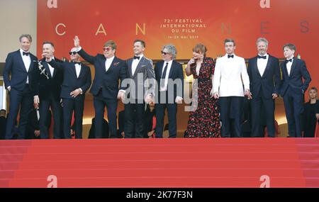 (From L) British record producer Giles Martin, Canadian filmmaker David Furnish, British songwriter Bernie Taupin, British singer-songwriter Elton John, British actor Taron Egerton and British director Dexter Fletcher pose as they arrive for the screening of the film 'Rocketman' at the 72nd edition of the Cannes Film Festival in Cannes, southern France, on May 16, 2019. -  ©P LAPOIRIE - CANNES 16/05/2019   Stock Photo
