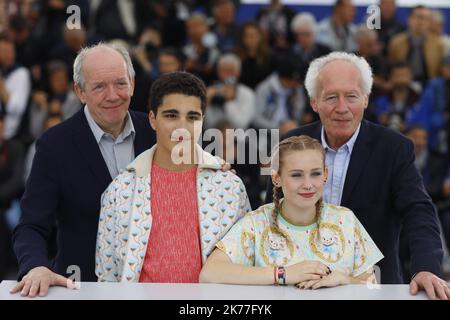 Belgian directors Jean-Pierre Dardenne (R) and Luc Dardenne (L) pose with Belgian actor Idir Ben Addi (2-L) and Victoria Bluck during the photocall for 'Le Jeune Ahmed' (Young Ahmed) at the 72nd annual Cannes Film Festival, in Cannes, France, 21 May 2019. The movie is presented in the Official Competition of the festival which runs from 14 to 25 May Stock Photo