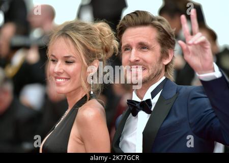 Philippe Lacheau and Elodie Fontan attending the screening of Once Upon A Time In Hollywood during the 72nd annual Cannes Film Festival on May 21, 2019 in Cannes, France.  Stock Photo