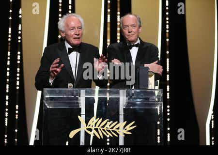 Belgian director Jean-Pierre Dardenne (L) and Belgian director Luc Dardenne on stage after they won the Best Director prize for the film 'Young Ahmed (Le Jeune Ahmed) Stock Photo